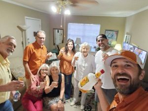 Grace Hollinger and her UT football watch pary