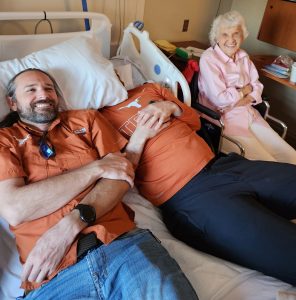 Picure of Grace Hollinger at a UT Football Watch Party while in the hospital